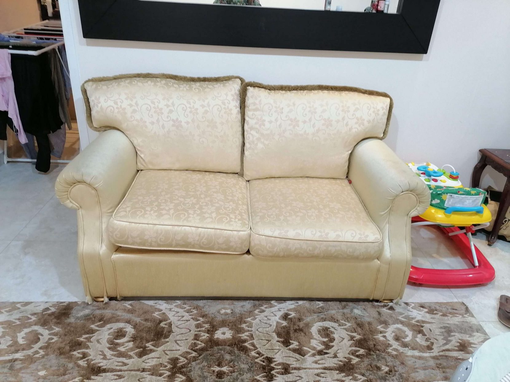 Two seater sofa is on urgent sale  price 150